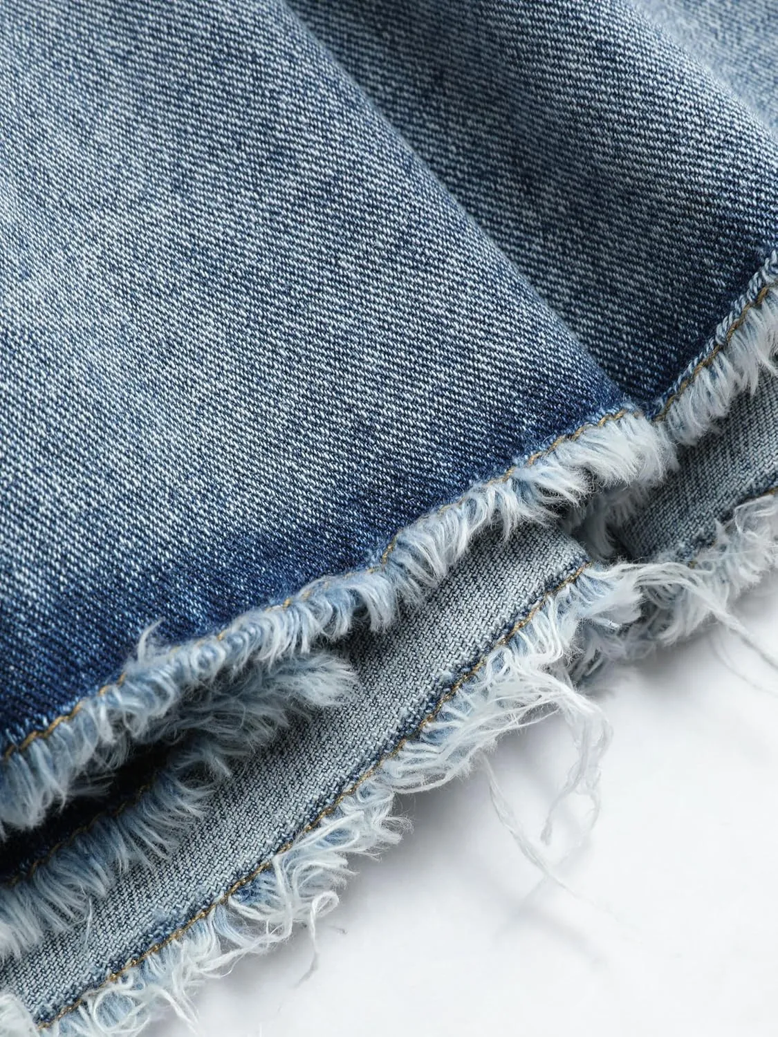 CIDER Women's Denim High Waist Pleated Raw Hem Mini Skirt